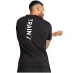 PUMA GRAPHICS TRAINING VERTICAL LOGO TEE MEN 526569 - Image 2